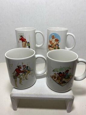 Set up for vintage Norman Rockwell fishing mugs 1987 museum collections INC